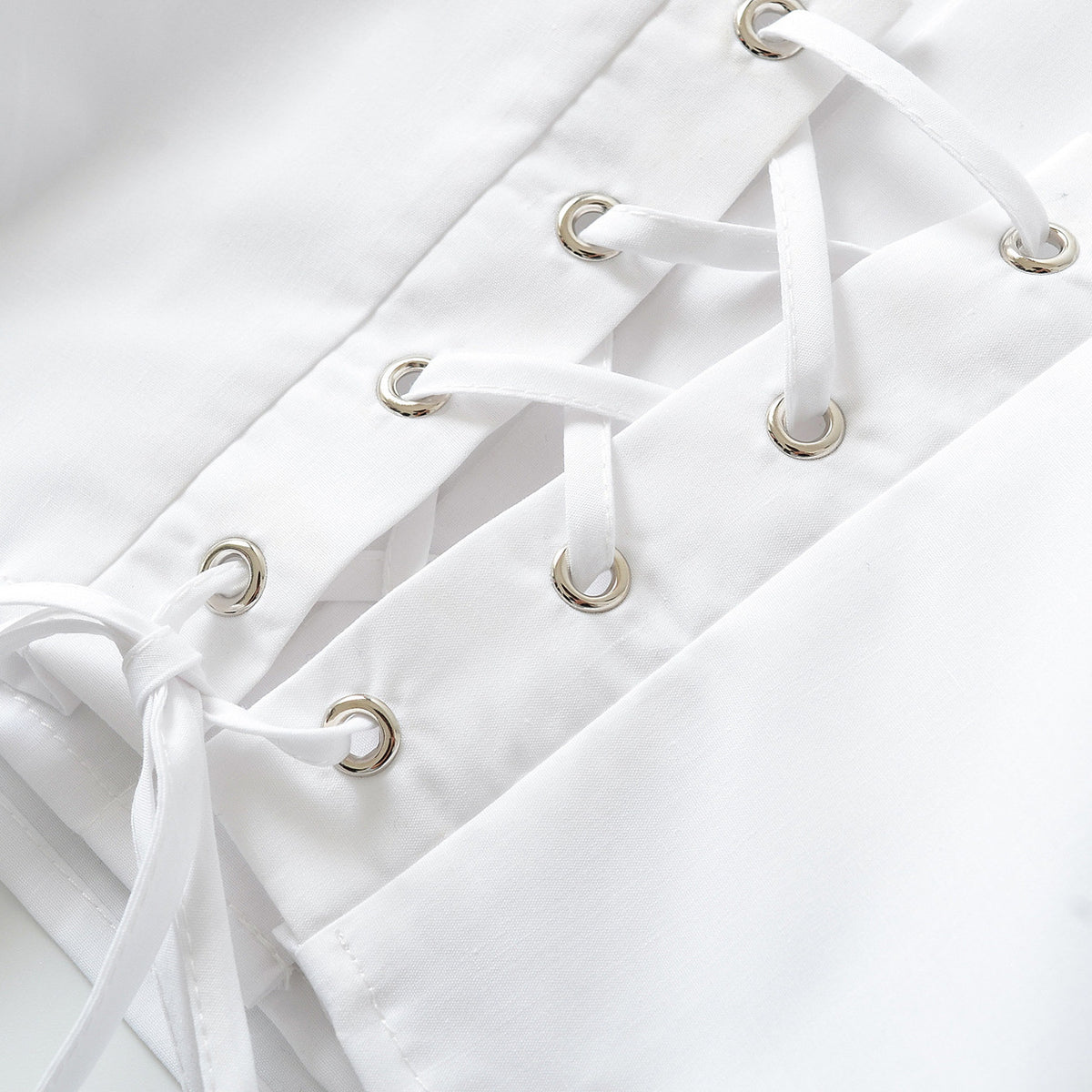 Long sleeved lace up shirt