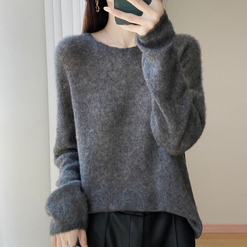 Round neck sweater top paired with knitted sweater for women