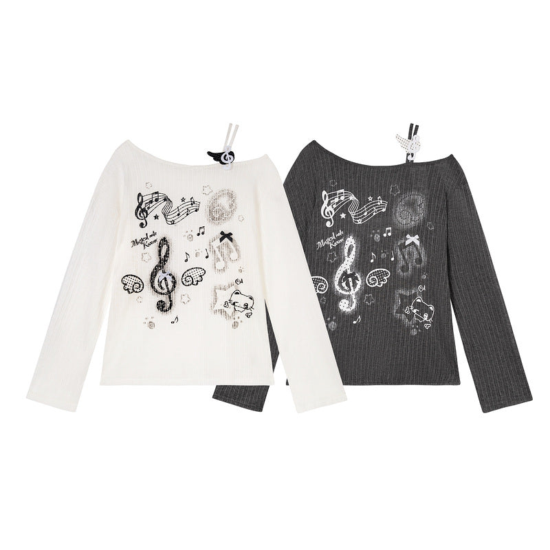 Long sleeved T-shirt with slanted shoulder and groove pattern