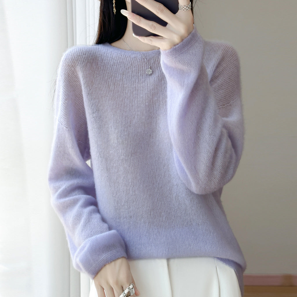 Round neck sweater top paired with knitted sweater for women