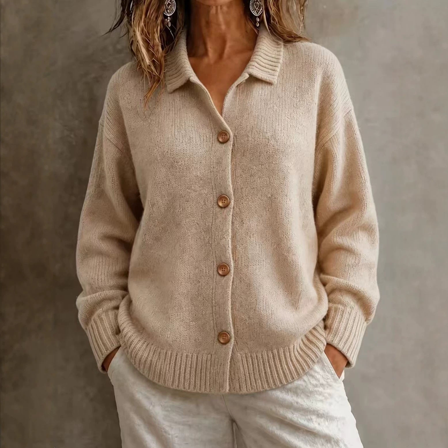 Single breasted long sleeved sweater jacket